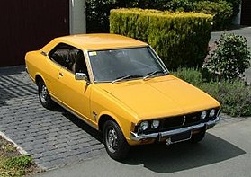 Mitsubishi Galant Yellow on a driveway.jpg